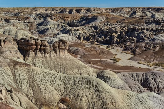 The Painted Desert on a sunny day. Diverse sedimentary rocks and clay washed out by water. Petrified Forest National Park, USA,  Arizona