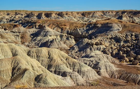 The Painted Desert on a sunny day. Diverse sedimentary rocks and clay washed out by water. Petrified Forest National Park, USA,  Arizona