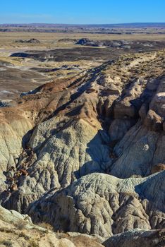 The Painted Desert on a sunny day. Diverse sedimentary rocks and clay washed out by water. Petrified Forest National Park, USA,  Arizona