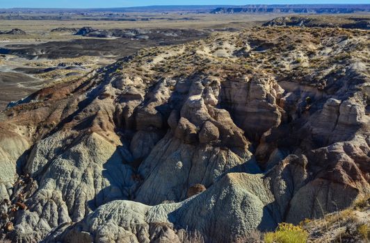 The Painted Desert on a sunny day. Diverse sedimentary rocks and clay washed out by water. Petrified Forest National Park, USA,  Arizona