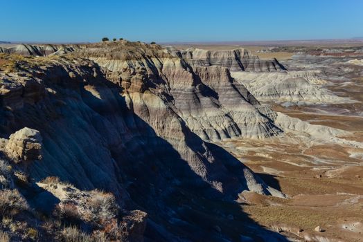 The Painted Desert on a sunny day. Diverse sedimentary rocks and clay washed out by water. Petrified Forest National Park, USA,  Arizona