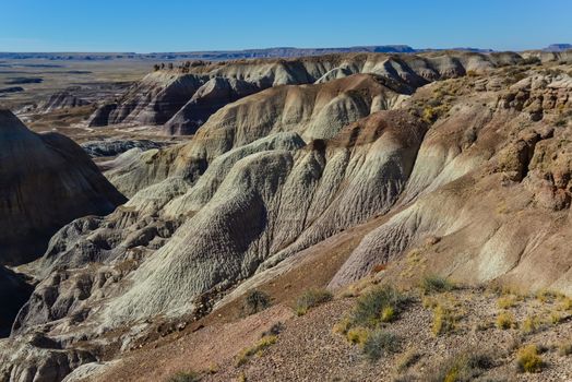 The Painted Desert on a sunny day. Diverse sedimentary rocks and clay washed out by water. Petrified Forest National Park, USA,  Arizona