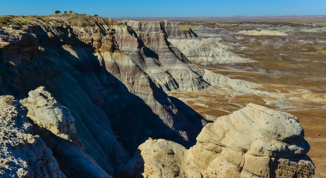 The Painted Desert on a sunny day. Diverse sedimentary rocks and clay washed out by water. Petrified Forest National Park, USA,  Arizona