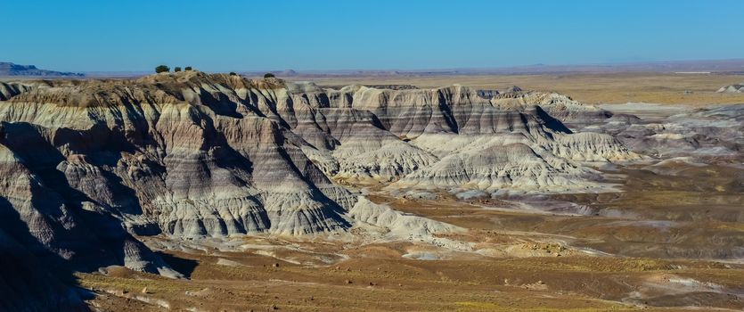 The Painted Desert on a sunny day. Diverse sedimentary rocks and clay washed out by water. Petrified Forest National Park, USA,  Arizona