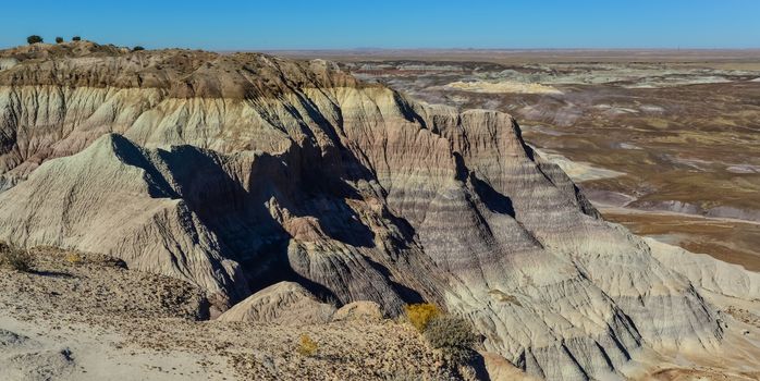 The Painted Desert on a sunny day. Diverse sedimentary rocks and clay washed out by water. Petrified Forest National Park, USA,  Arizona