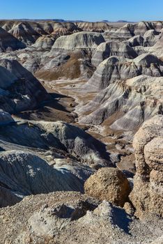 The Painted Desert on a sunny day. Diverse sedimentary rocks and clay washed out by water. Petrified Forest National Park, USA,  Arizona