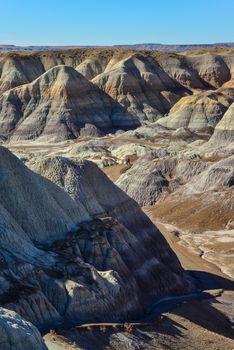 The Painted Desert on a sunny day. Diverse sedimentary rocks and clay washed out by water. Petrified Forest National Park, USA,  Arizona