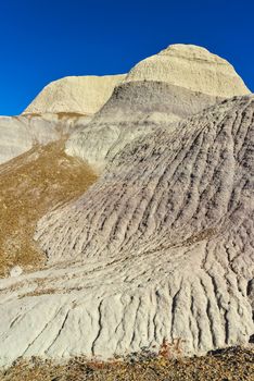 The Painted Desert on a sunny day. Diverse sedimentary rocks and clay washed out by water. Petrified Forest National Park, USA,  Arizona