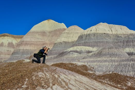 USA, ARIZONA- NOVEMBER 18, 2019: The Painted Desert on a sunny day. Diverse sedimentary rocks and clay washed out by water. Petrified Forest National Park, USA,  Arizona  