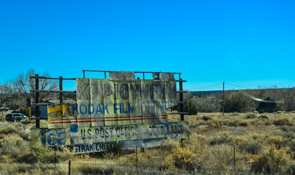 USA, ARIZONA - NOVEMBER 17, 2019:  old advertising signs along a road on an Indian reservation in a suburb of Phoenix, Arizona