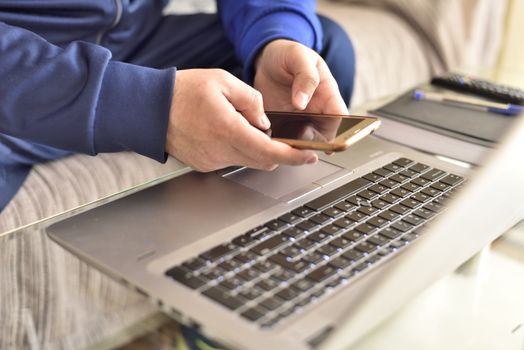 Man teleworking from home after coronavirus pandemic.