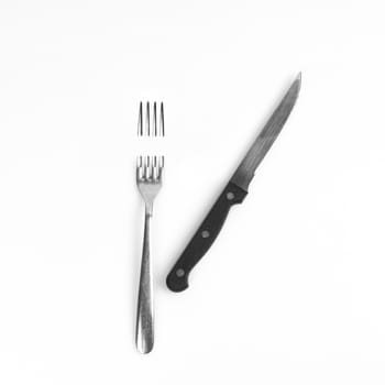 a fork cut with a knife