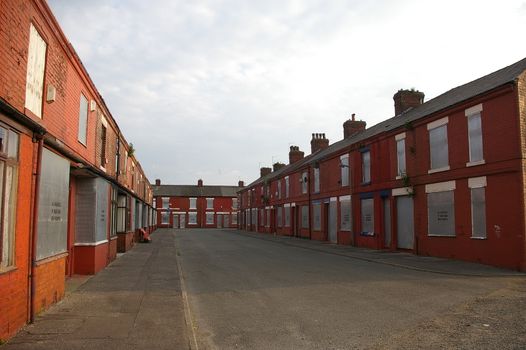 Boarded up terraced houses in Manchester, UK