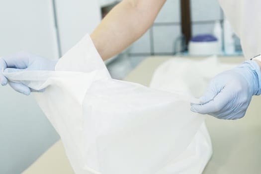 The master - beautician prepares the workplace In a beauty salon