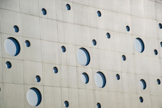 Background texture. A wall with round holes in the form of gas bubbles.