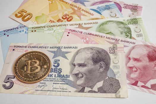 close up cryptocurrency coins on banknotes background