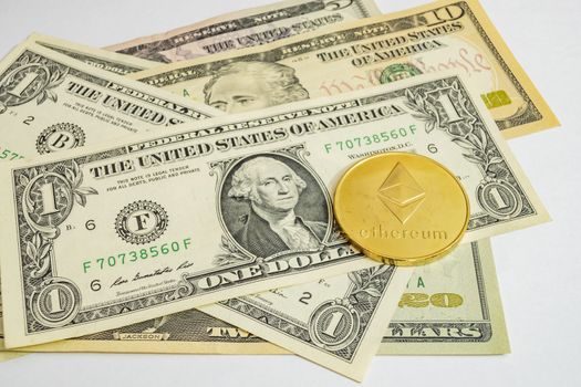 close up cryptocurrency coins on banknotes background