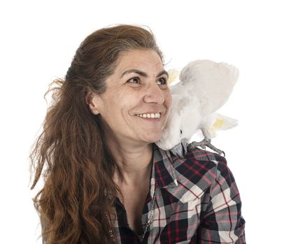 cockatoo and woman in front of white background