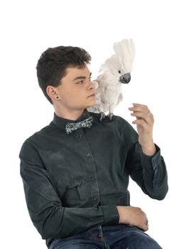 cockatoo and teen in front of white background