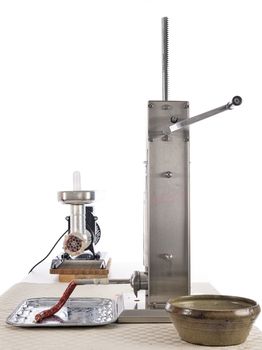 meat mincer in front of white background