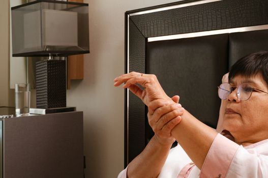 old woman suffering from wrist hand pain, health problem concept