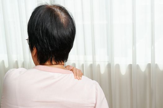 neck and shoulder pain, old woman suffering from neck and shoulder injury, health problem concept