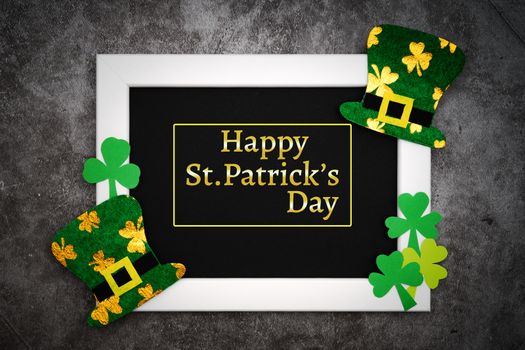 St Patricks day, festive leprechaun hat and green Shamrocks on photo frame