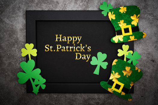 St Patricks day, festive leprechaun hat and green Shamrocks on photo frame