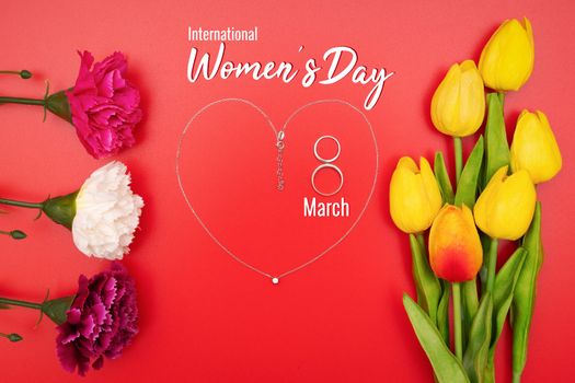 International Womens Day with flowers and heart shape necklace on red background