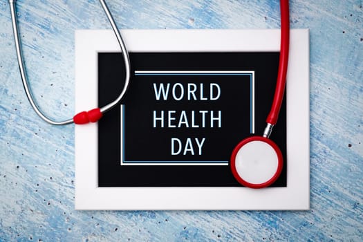World health day, healthcare and medical concept, red stethoscope and photo frame