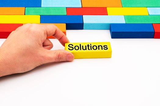 fill in business solutions concept, a piece of wooden block puzzle fit in a blank space