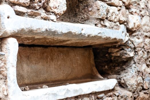 side view of interesting antique stone storage or furnace. photo has taken at ancient city efes.