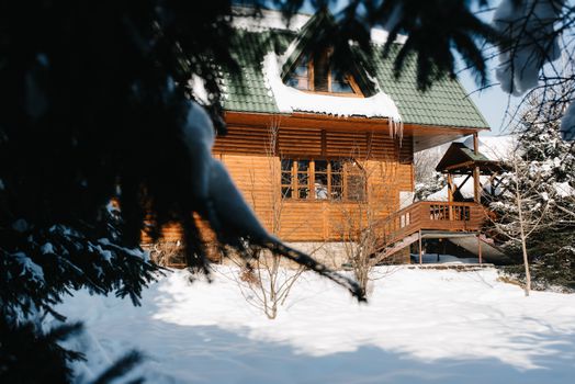 guy and girl in the house near the window overlooking a snowy landscape