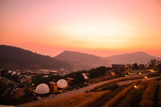 The sunset in a thai village near mountains in Chiang Mai, Thailand. The mountain scenery view