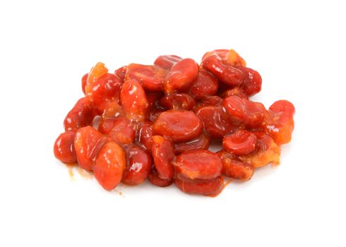 Pile of sticky, red bitter melon seeds - momordica charantia - isolated on a white background