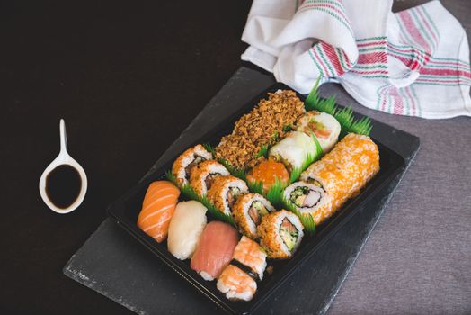 Raw fresh Salmon sushi roll maki - japanese food.