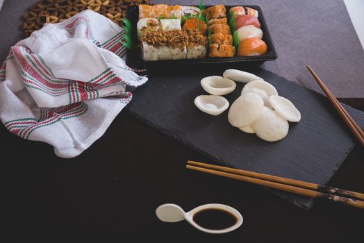 Raw fresh Salmon sushi roll maki - japanese food.