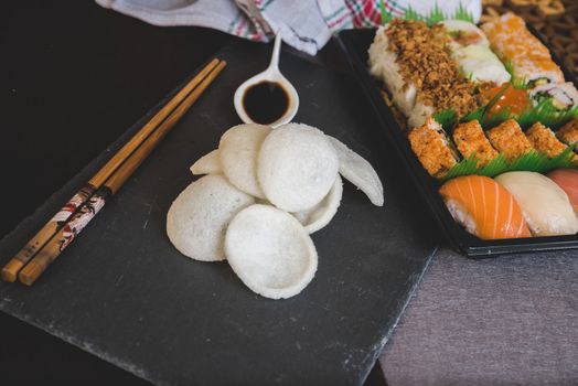 Raw fresh Salmon sushi roll maki - japanese food.