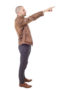 young casual man pointing, isolated on white