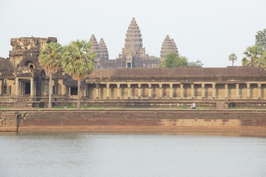 Siem reap cambodia sun set golden hour temple with trees angkor wat