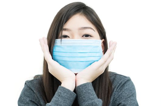 Close up woman long hair propping up chin with his hands and wearing protective mask for protection against virus Covid-19 on white