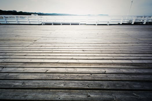 Wooden pier in Sopot, Poland. Jetty on the water. Baltyk sea.