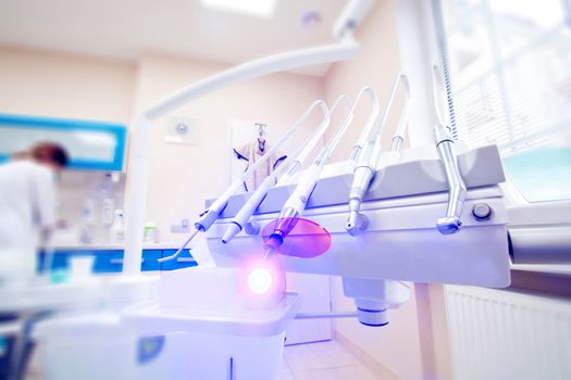 Professional Dentist tools in the dental office. Dental Hygiene and Health conceptual image.