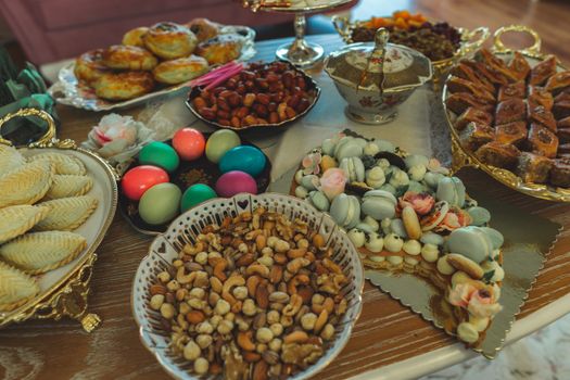 Traditional Azerbaijan holiday Nowruz cookies, baklava, other sweets on the table for celebration.