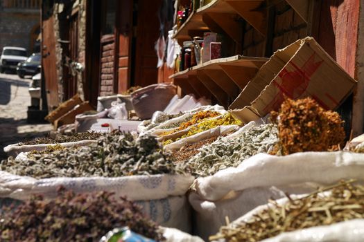 Lahic, Azerbaijan - 17th September 2017: Various spices in sacks on sale in the village bazaar.