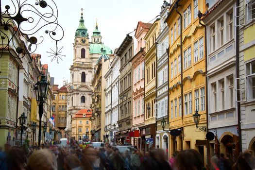 Crowd of tourists on streets of Prague. Tourism concept.