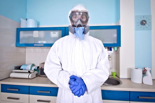 Doctor in protective suit uniform and mask. Coronavirus outbreak. Covid-19 concept.