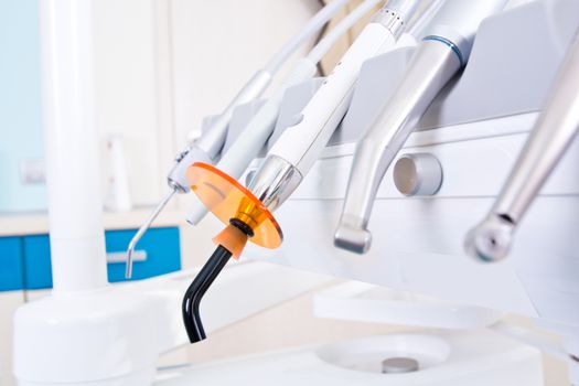 Professional Dentist tools in the dental office. Dental Hygiene and Health conceptual image.