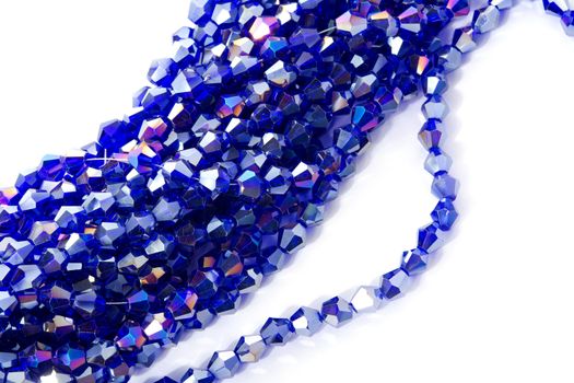Beautiful Light Blue Glass Sparkle Crystal Isoalted Beads on white background. Use for diy beaded jewelry