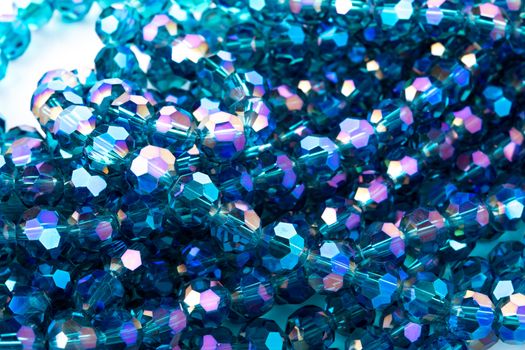 Beautiful Light Blue Glass Sparkle Crystal Isoalted Beads on white background. Use for diy beaded jewelry